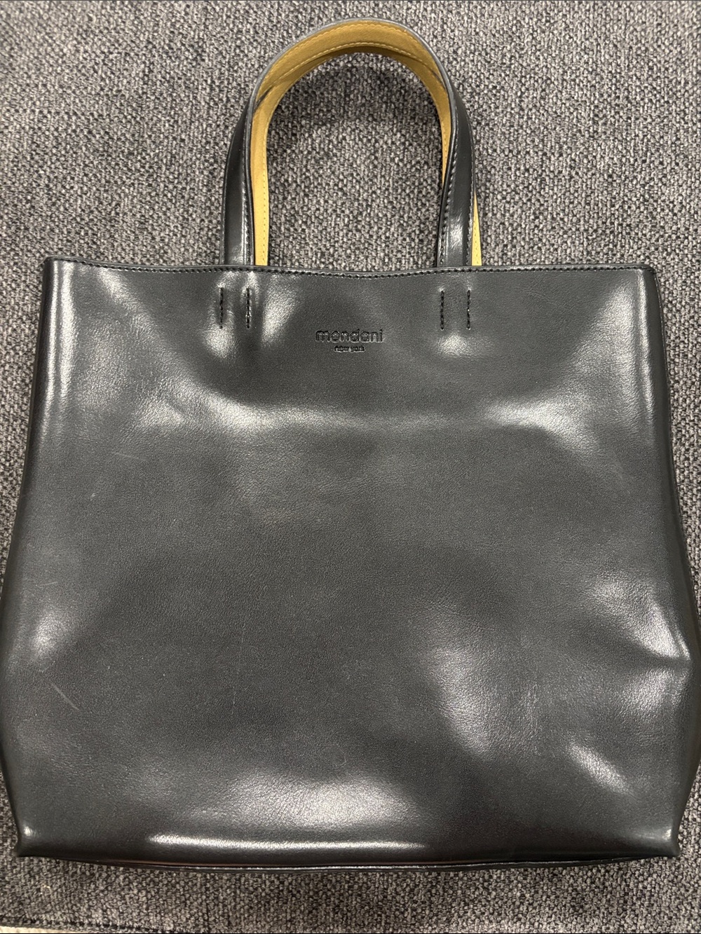 Mondani New York Black Leather Tote Bag laser cut purse
